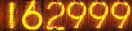 162999